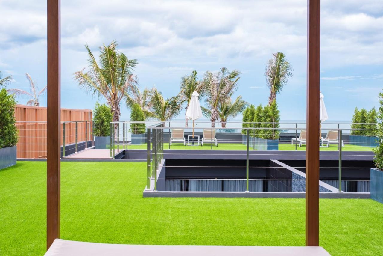 The Yana Villas Hua Hin Exterior photo Artificial grass on a rooftop